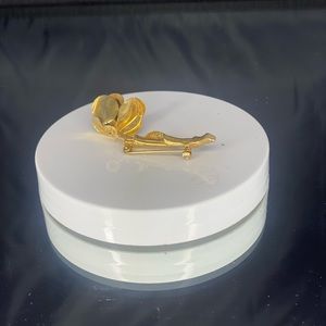 Gold colored rose broach